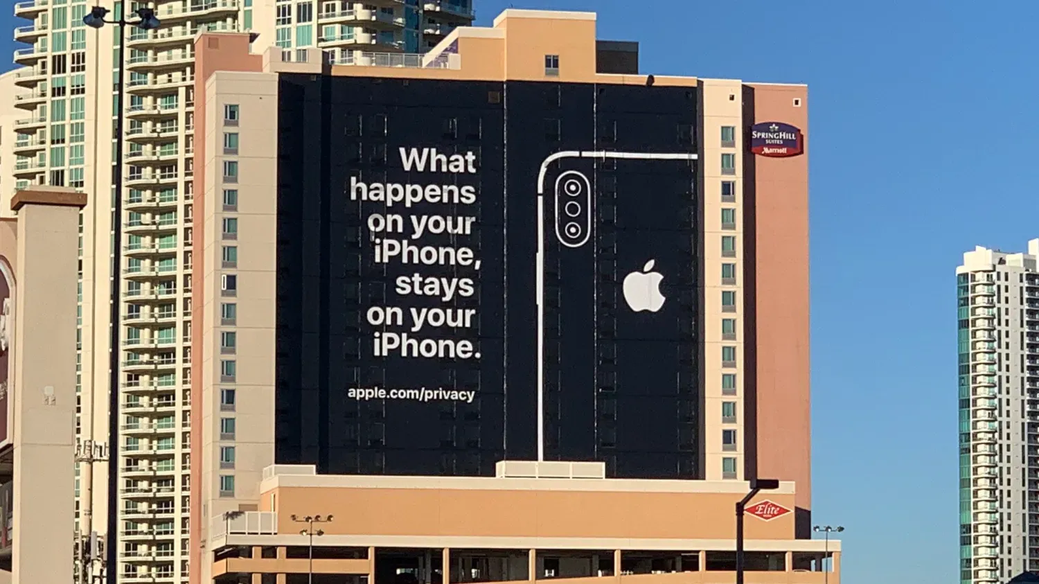 A billboard for the iPhone that states ‘What happens on your iPhone, stays on your iPhone.’